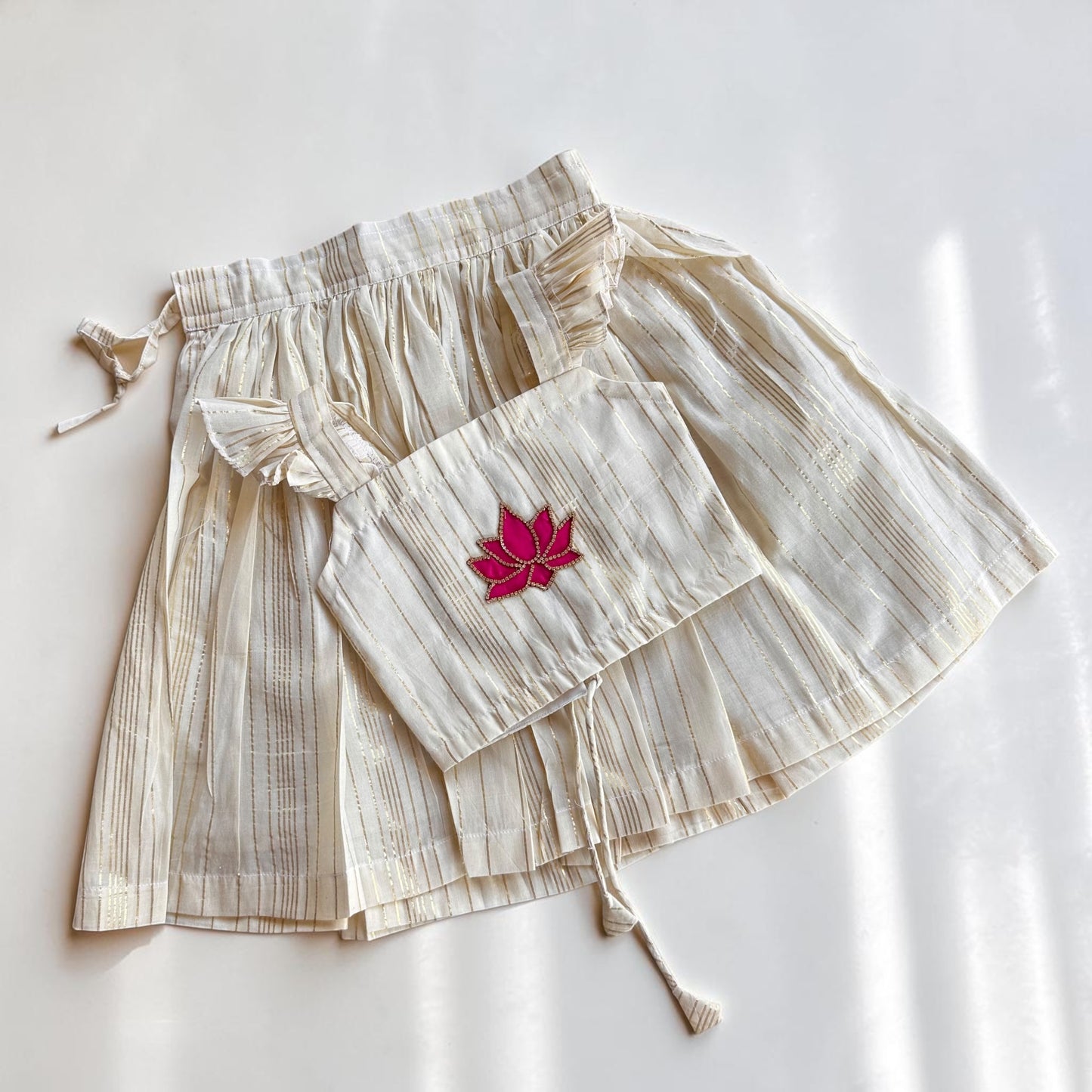 Ivory Gold Striped Pattu Pavada Set with Lotus Detail