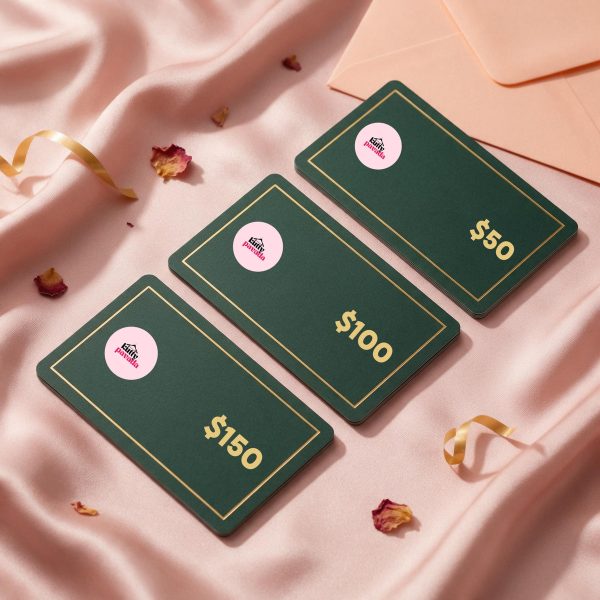 Kutty Pavada digital gift cards in $50, $100 and $150, in a peach envelope