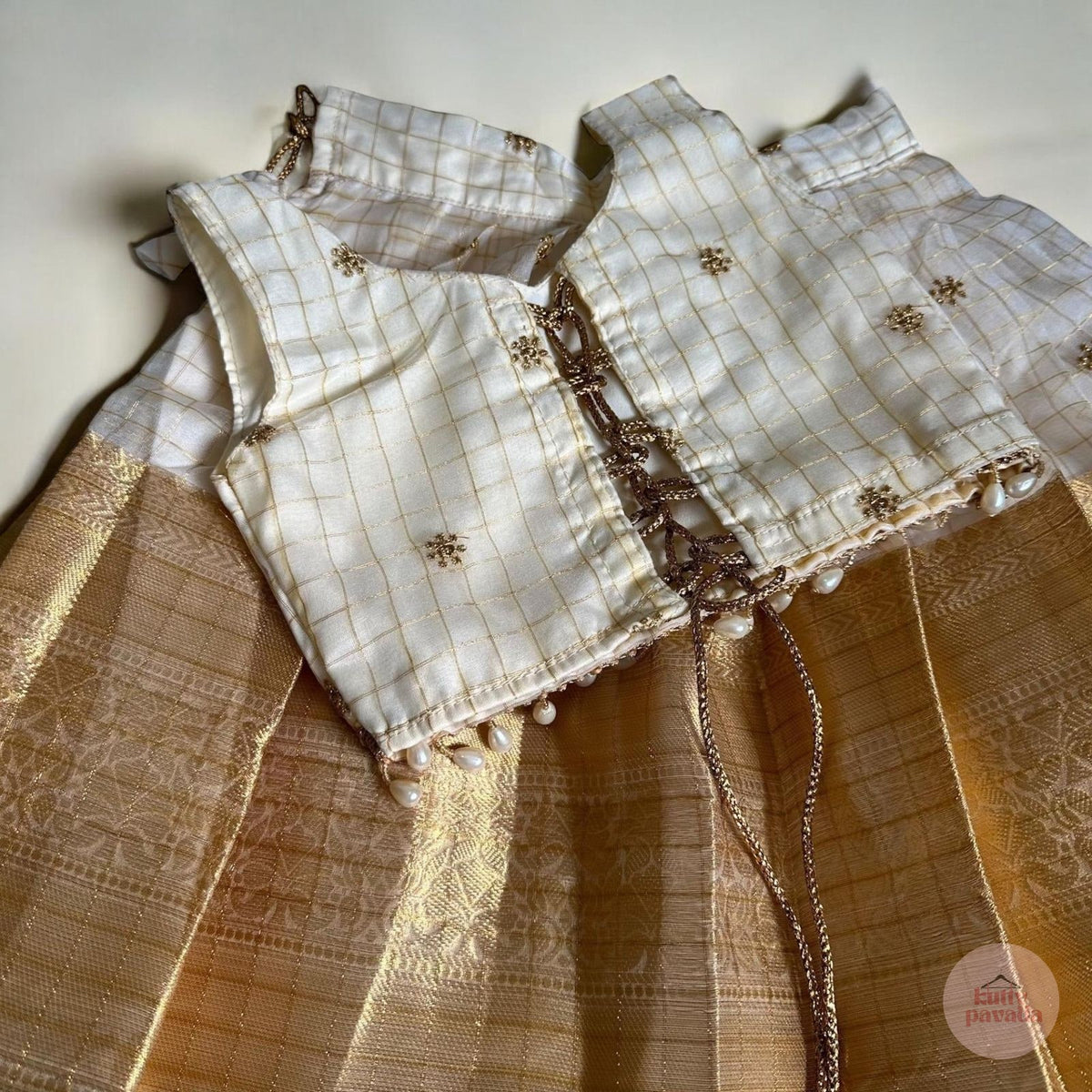 Checkered Gold Kasavu Pattupavada with Pearl Trim